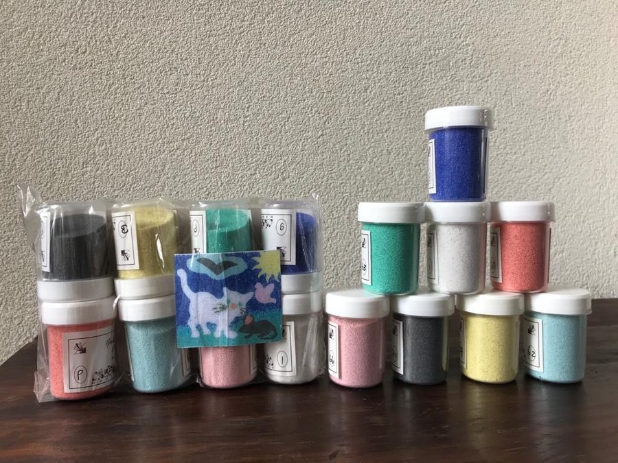 Pakketje gekleurd zand — Pastel
